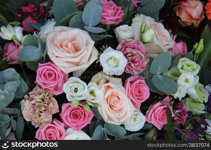 Pink and white roses in a mixed bridal bouquet