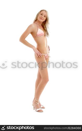 pink bikini girl on high heels over white background