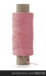 pink bobbin thread over a white background