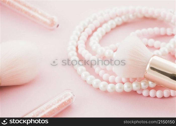 pink brushes pearl necklace