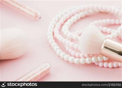 pink brushes pearl necklace