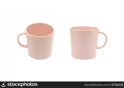 Pink ceramic cups isolated on white background