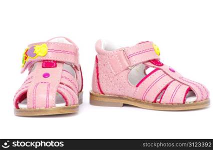pink child&rsquo;s sandals isolated on white
