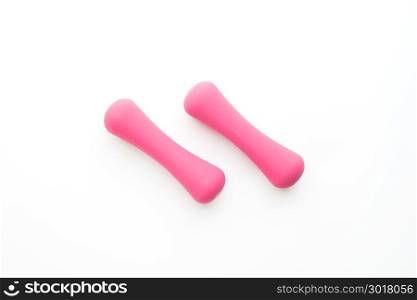Pink color dumbbells on white background, Healthy concept