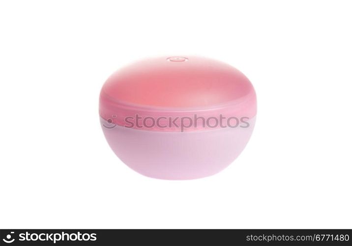 Pink cosmetic jar with cream isolated on white background, studio shot