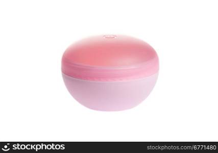 Pink cosmetic jar with cream isolated on white background, studio shot
