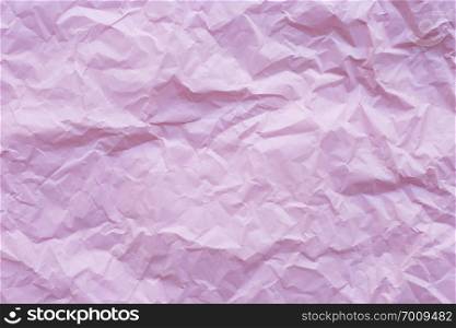 Pink crumpled recycle paper background