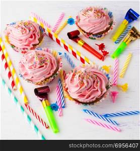 Pink delicious birthday cupcakes. Pink delicious birthday cupcakes, square. Birthday cupcakes. Homemade cupcake. Sweet cupcake. Gourmet cupcakes. Sweet dessert. Sweet pastry. Birthday invitation.