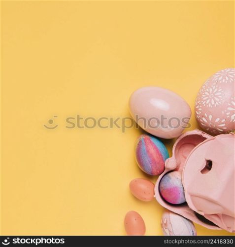 pink easter eggs corner yellow background