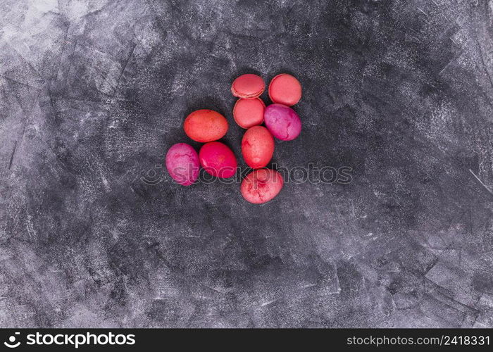 pink easter eggs with macaroons table