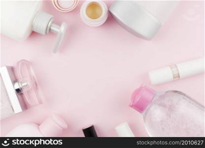 pink face care products creating round frame