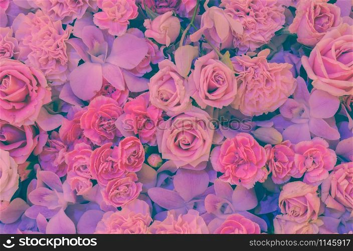 Pink flower background of rose, carnation and orchid. Soft filtered effect image