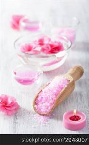 pink flower salt and essential oil for spa