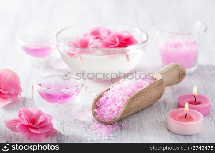 pink flower salt and essential oil for spa