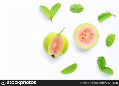 Pink guava with leaves on white background. Copy space