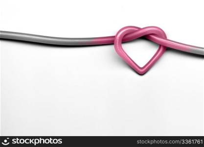 pink heart knot on white background - valentine day concept