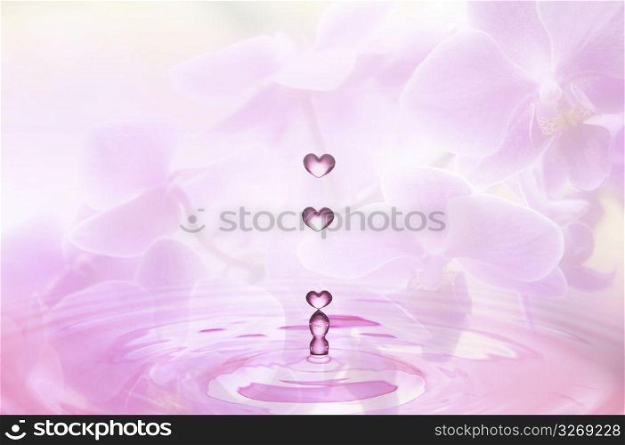 Pink heart shaped water droplets falling into pink water on a flowered background