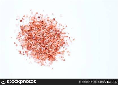 Pink himalayan salt on with background. Copy space
