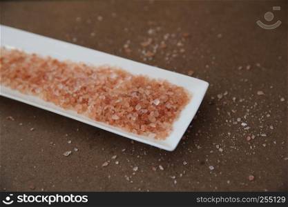 pink himalayan salt on wooden