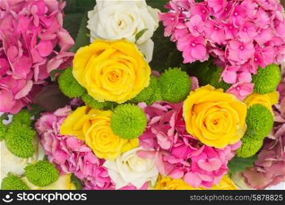 pink hortensia flowers. bunch of pink hortensia flowers with roses and mums close up