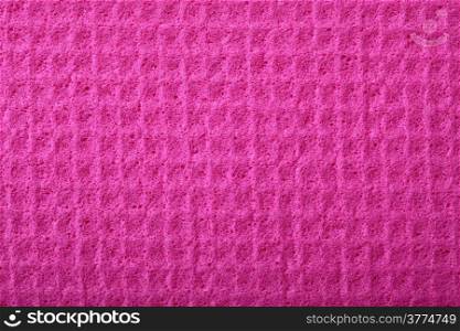 Pink kitchen sponge rubber foam as background texture