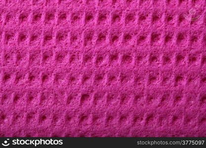 Pink kitchen sponge rubber foam as background texture