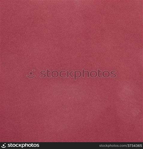 Pink leather texture closeup detailed background.