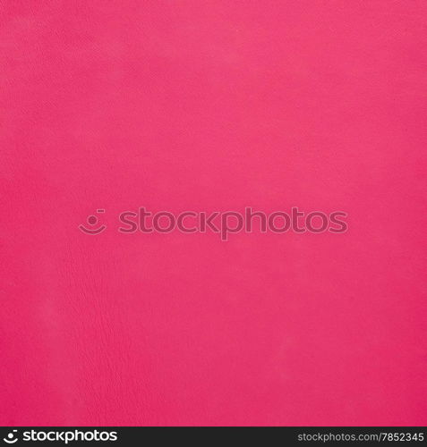 Pink leather texture closeup detailed background.