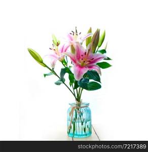 pink lily flower bunch bouquet over white copyspace