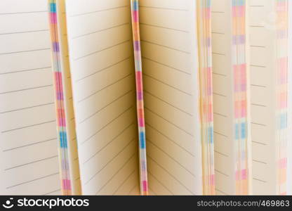 Pink notebook on a white background