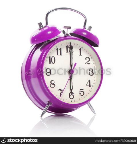 pink old style alarm clock isolated on white
