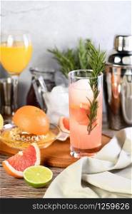 Pink Paloma cocktail with grapefruit juice, tequila and rosemary