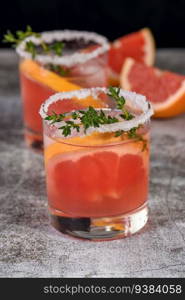 Pink Paloma with red grapefruit and tequila. The red grapefruit adds the perfect amount of sweetness, and the vibrant color of the juice makes this a great cocktail. Organic vegetarian drink.