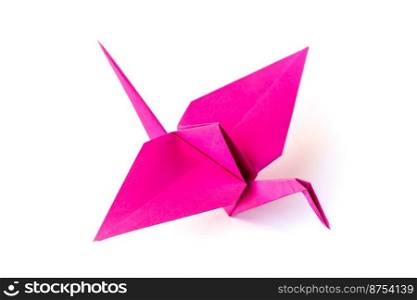 Pink paper crane origami isolated on a blank white background.. Pink paper crane origami isolated on a white background