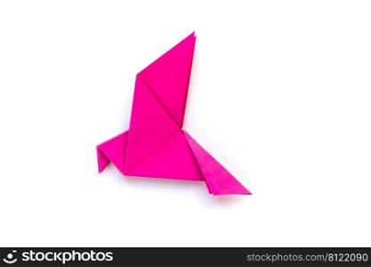 Pink paper dove origami isolated on a blank white background.. Pink paper dove origami isolated on a white background