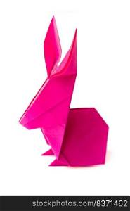 Pink paper rabbit origami isolated on a blank white background.. Pink paper rabbit origami isolated on a white background