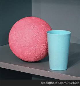 Pink papier mache ball and blue plastic cup in the corner of the shelf - abstract geometric design with space for copy.. Abstract Geometric Composition With Sphere