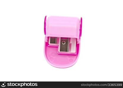 Pink pencil sharpener isolated on white background