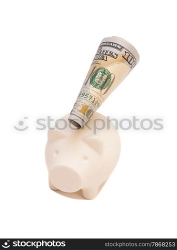Pink piggy bank and one hundred dollar bill, isolated on white background