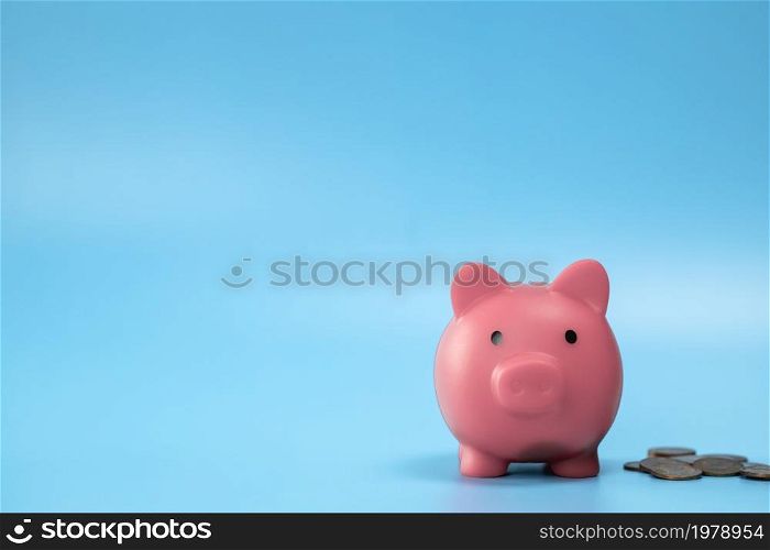 Pink Piggy Bank with stack of coins, growth and saving concept, Business and financial with copy space. space for text. Pink Piggy Bank with stack of coins, growth and saving concept, Business and financial with copy space.
