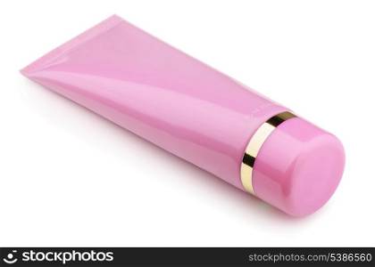 Pink plastic cosmetic tube isolated on white