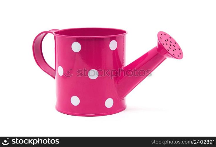 Pink polka dot watering can isolated on white