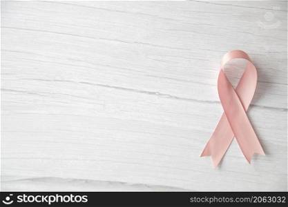 Pink ribbon breast cancer awareness, Health medical concept, white wooden background white wooden background copy space. Pink ribbon breast cancer awareness, Health medical concept, white wooden background