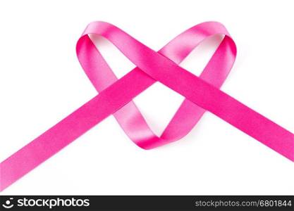 Pink ribbon in the shape of a heart isolated on white