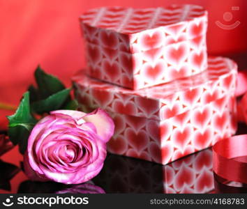 pink rose and gift boxes