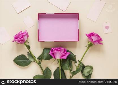 pink rose flowers with empty box table
