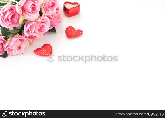 Pink roses and heart on white background