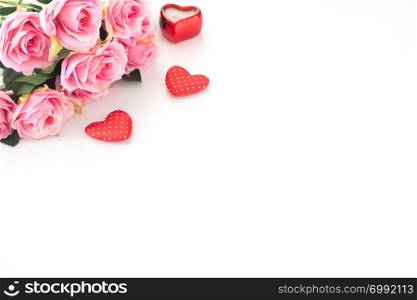 Pink roses and heart on white background