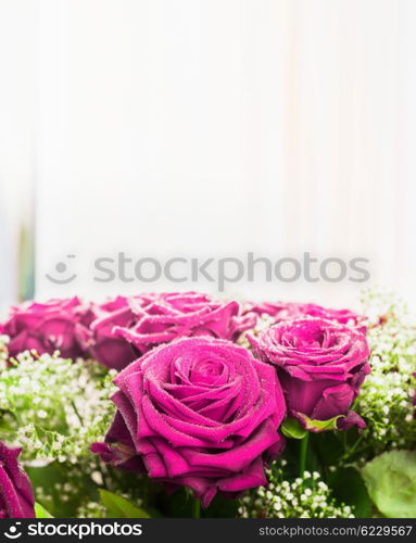 Pink roses bunch on light background, close up. Festive roses bouquet