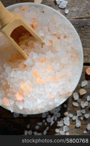 Pink salt from the Himalayas on wooden table